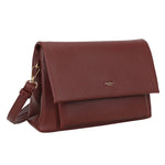 A rich burgundy pebbled leather bar flap crossover clutch with gold hardware clasp and adjustable crossbody strap
