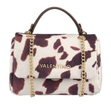A valentino ocarina winter flap bag cow with white and brown cowhide pattern and gold-tone chain straps and handles
