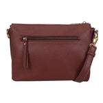 A maroon pebbled leather crossbody bag with gold tone hardware and detachable strap bar cmprtmnt crossover bordeaux red