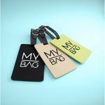 Navnelapp mybag luggage tags in black beige and pale yellow with matching leather straps for easy identification