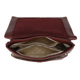 A bar flap crossover bordeaux red maroon leather crossbody bag with textured exterior and beige logo lining